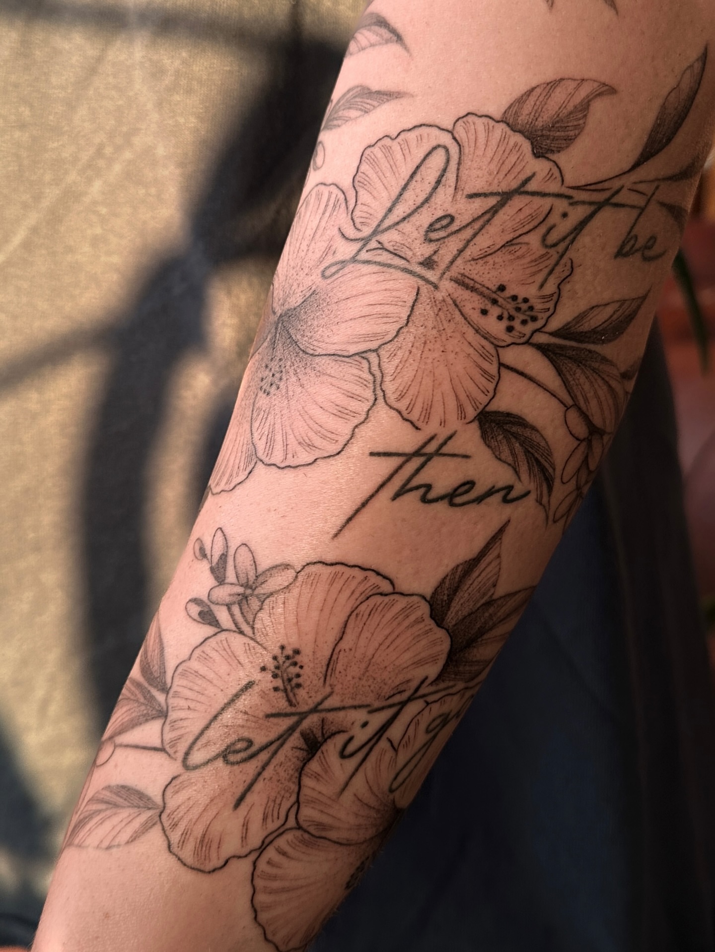 Flowers and script black and grey tattoo on the forearm by James Hix - Tattoo Artist, Fort Worth, Texas