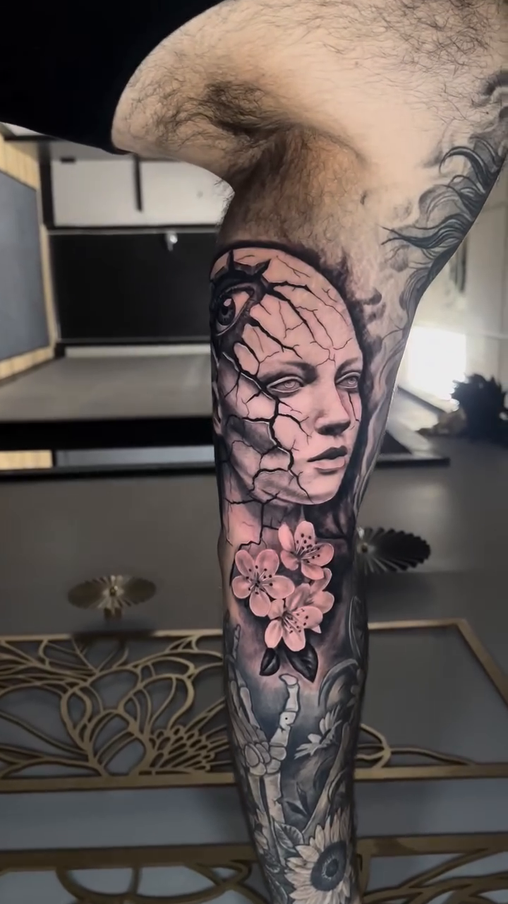 Cracked face with flowers dark realism tattoo by ๐๐๐๐ ๐๐๐๐