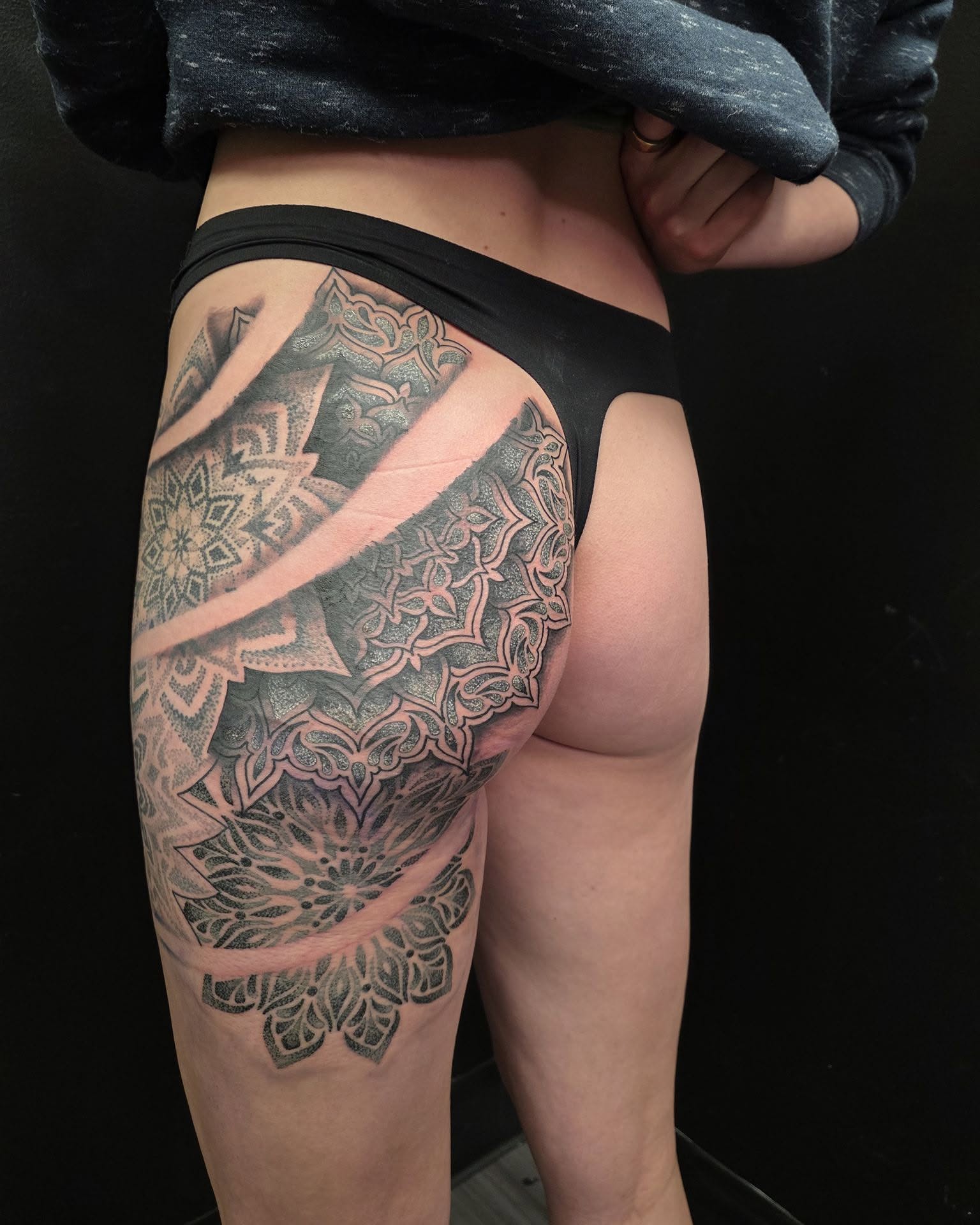 Mandala geometric tattoo on the thigh by Jordan Rookus
