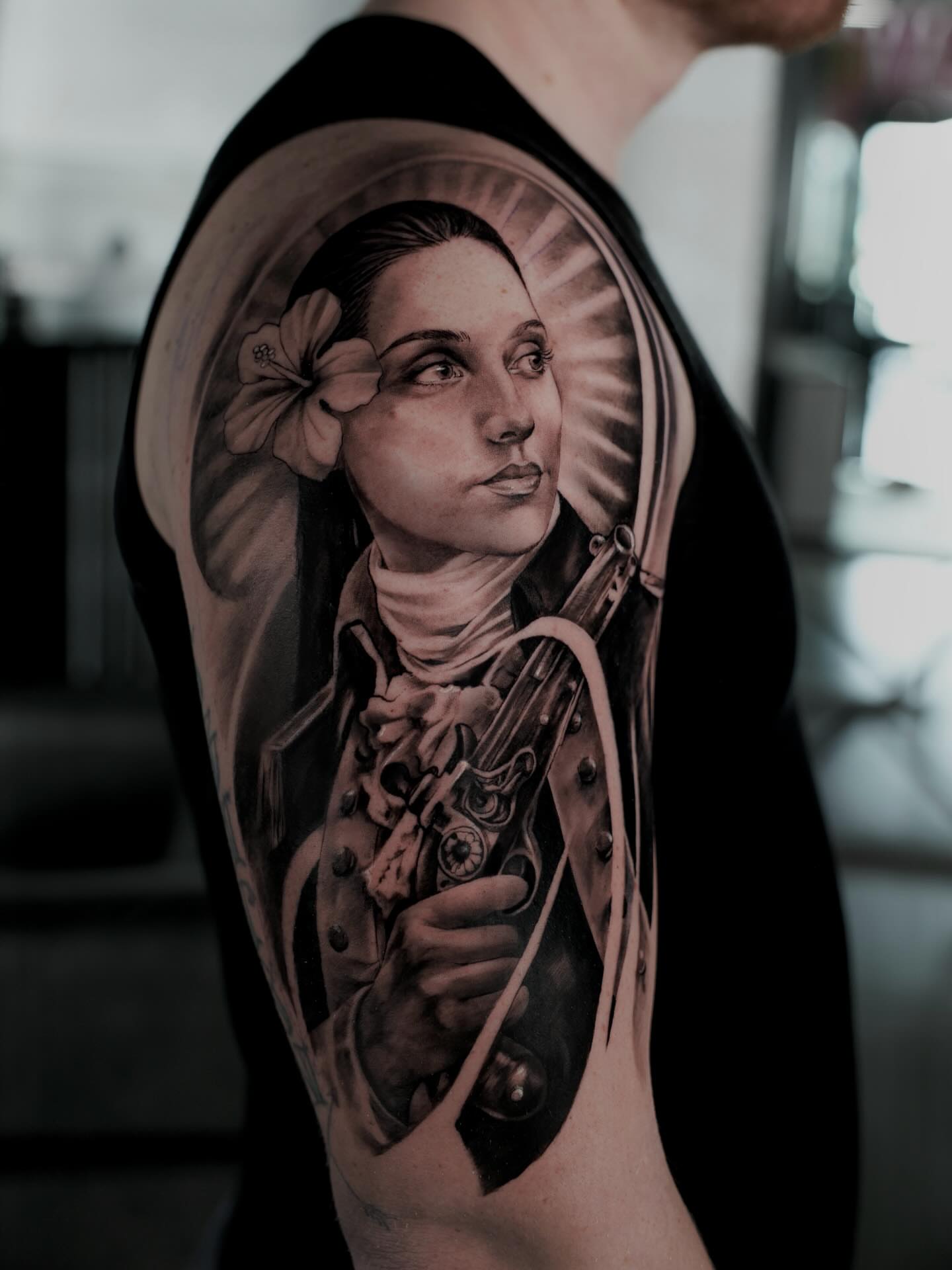Tattoo by @tattooandres191 — realism, black_and_grey