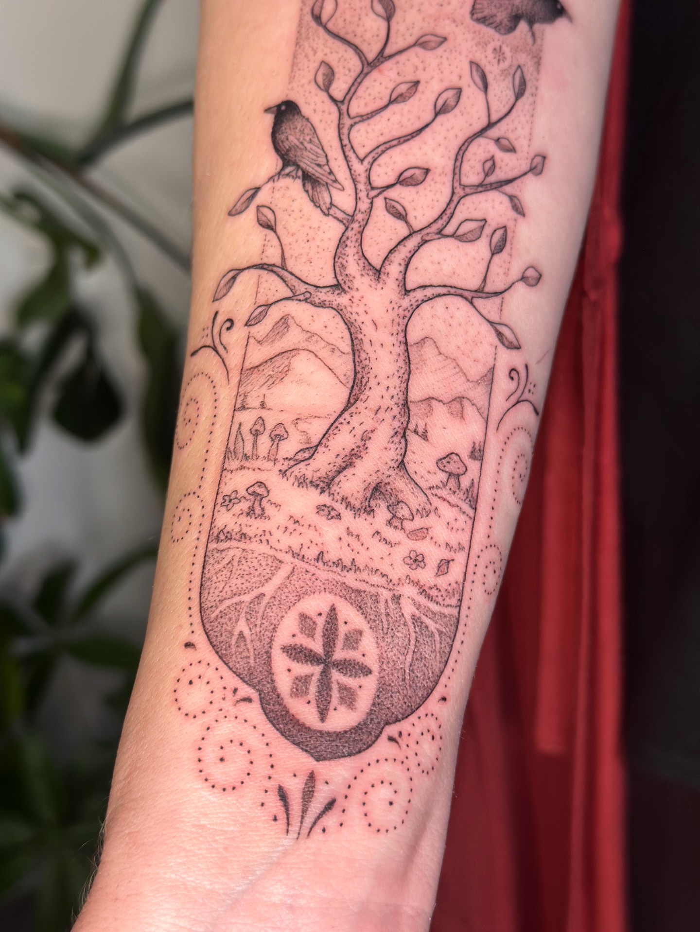 Tree with landscape dotwork tattoo on the forearm by Santiago Don, Portland, Oregon