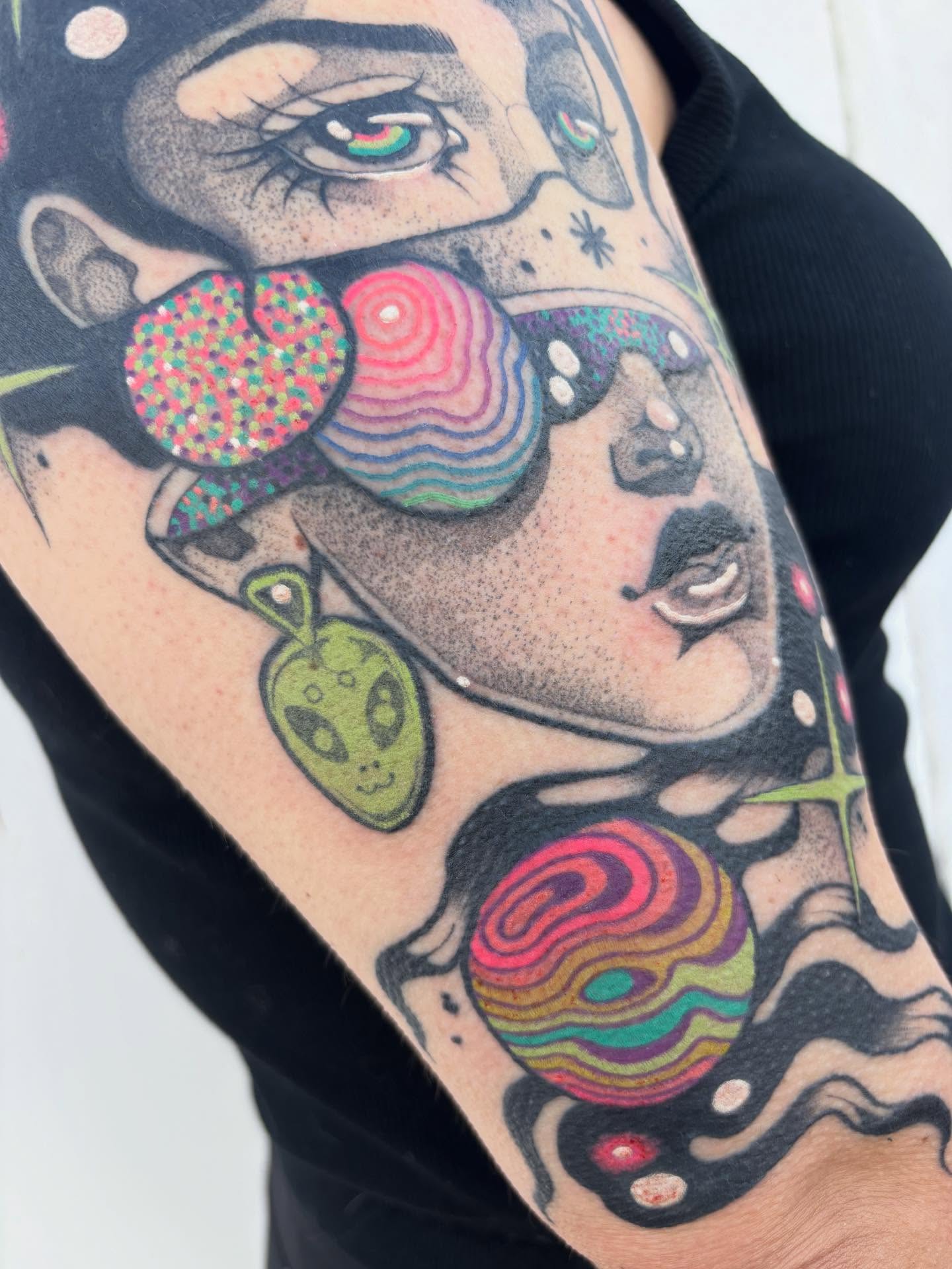 Abstract surrealism surrealism tattoo on the forearm by Carly Zehring