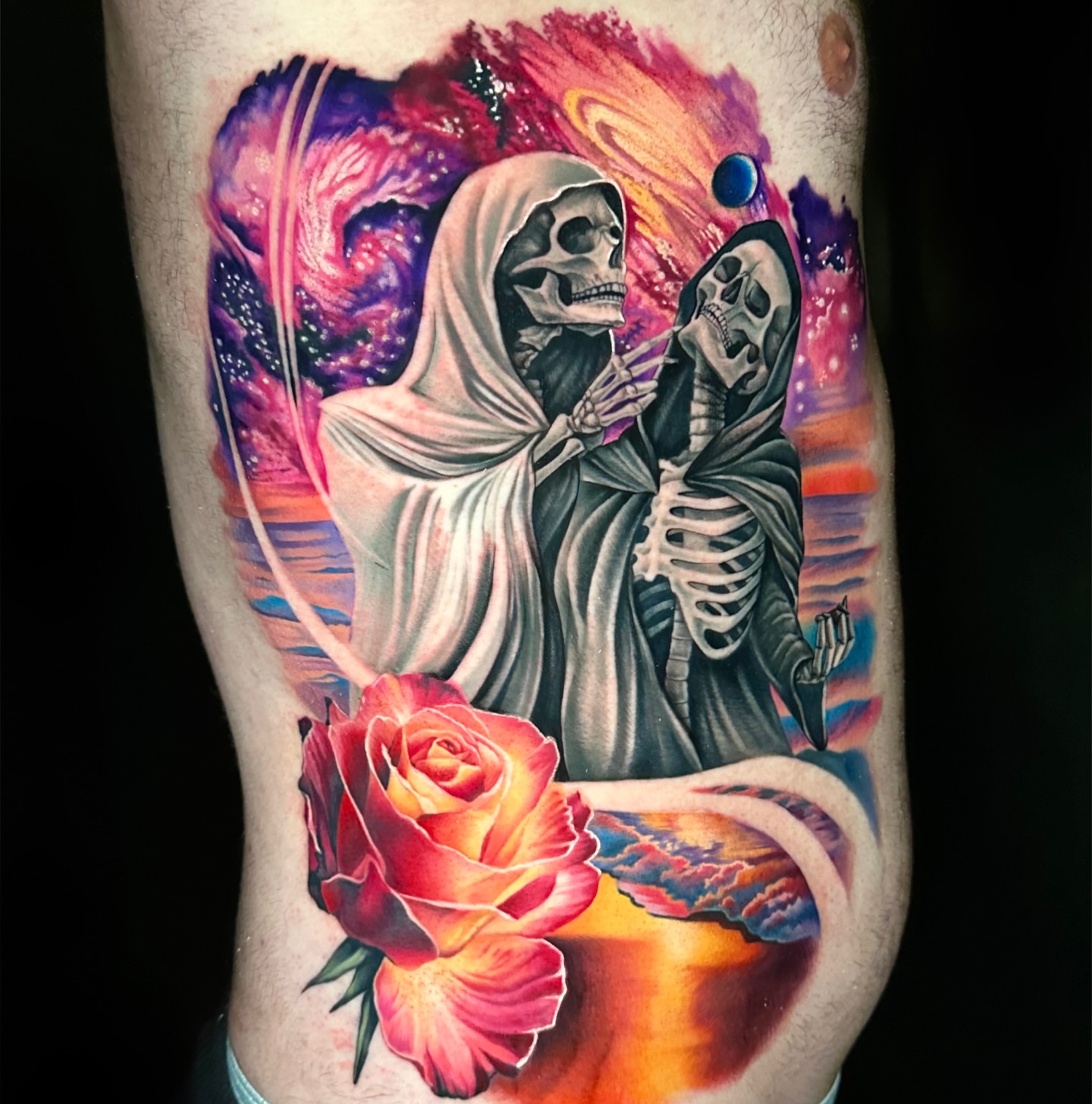 Skeletons and rose realism tattoo on the thigh by Chynna J El-Ayazra