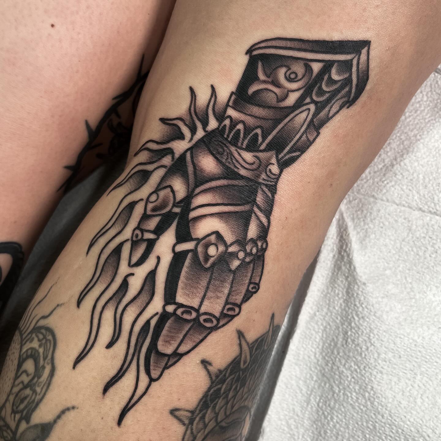 Robotic hand black and grey tattoo on the forearm by Sky G, Colorado Springs, Colorado