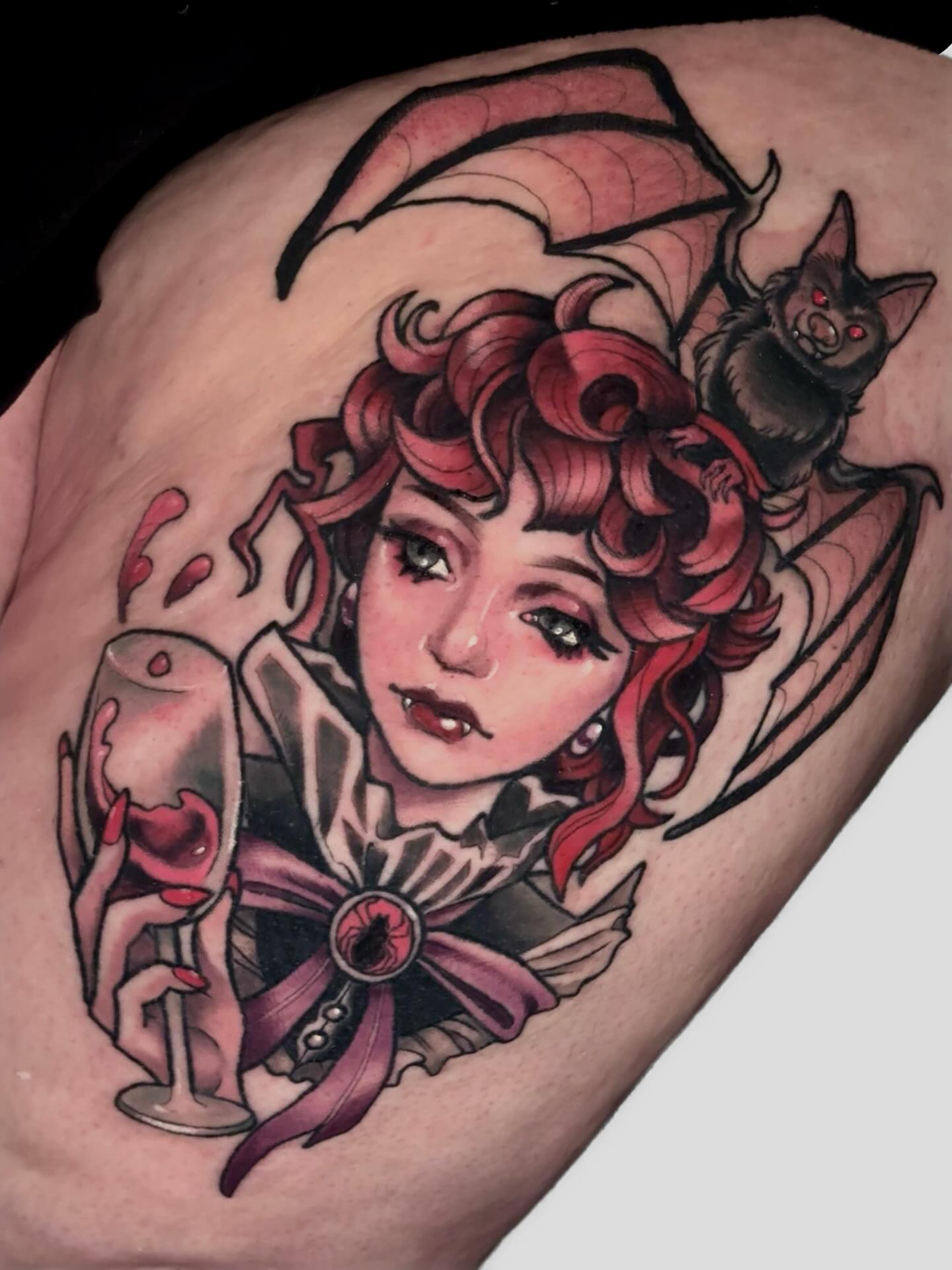 Woman with bat American traditional tattoo on the thigh by Ash Sansoucie