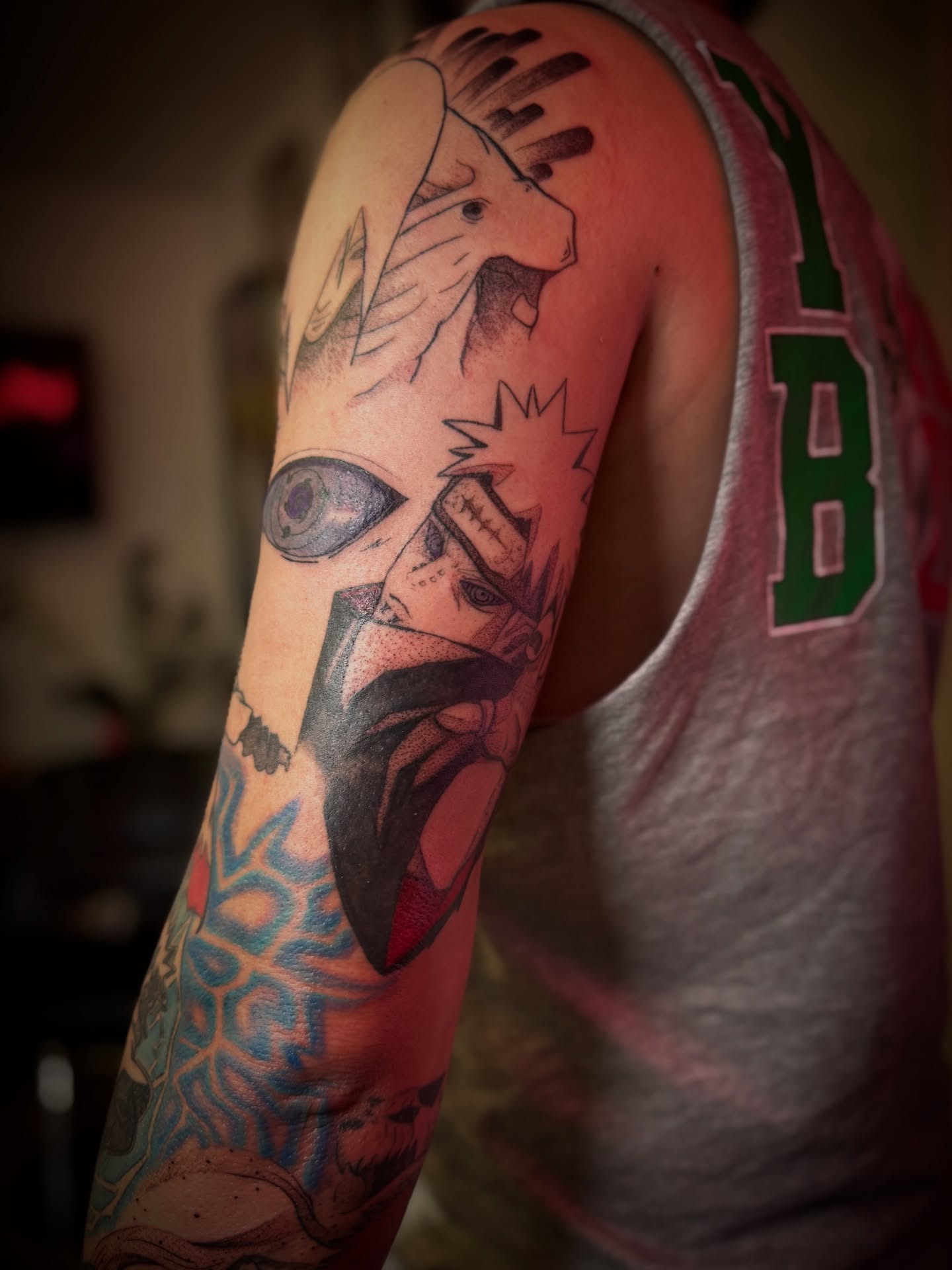 Abstract surrealism dotwork tattoo on the upper arm by Gianna G