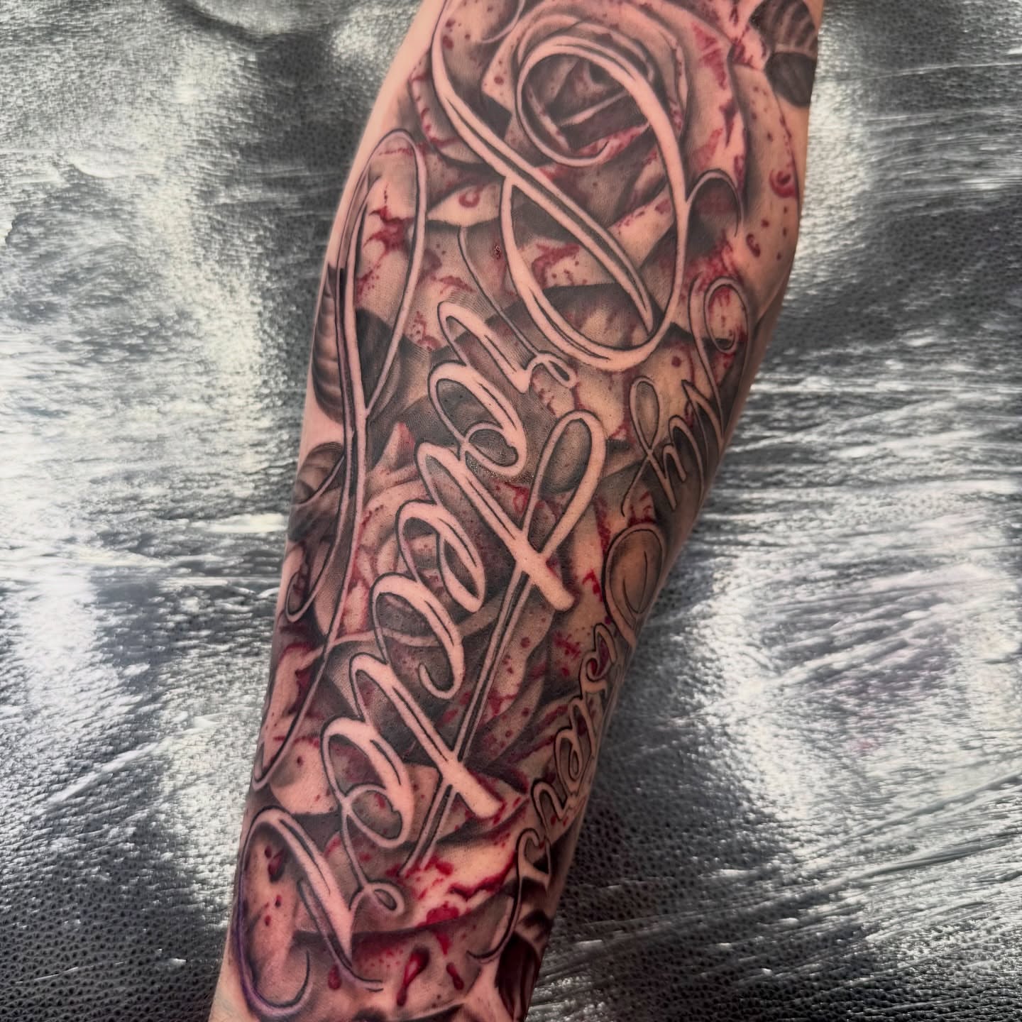 Tattoo by @scarlet.tattooz — lettering_script
