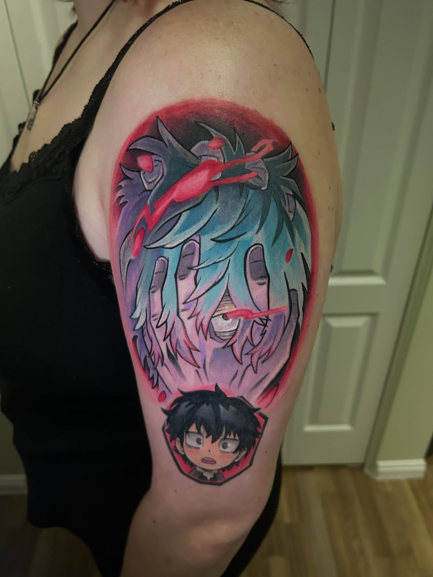 Anime character anime tattoo on the shoulder by Mando Castro