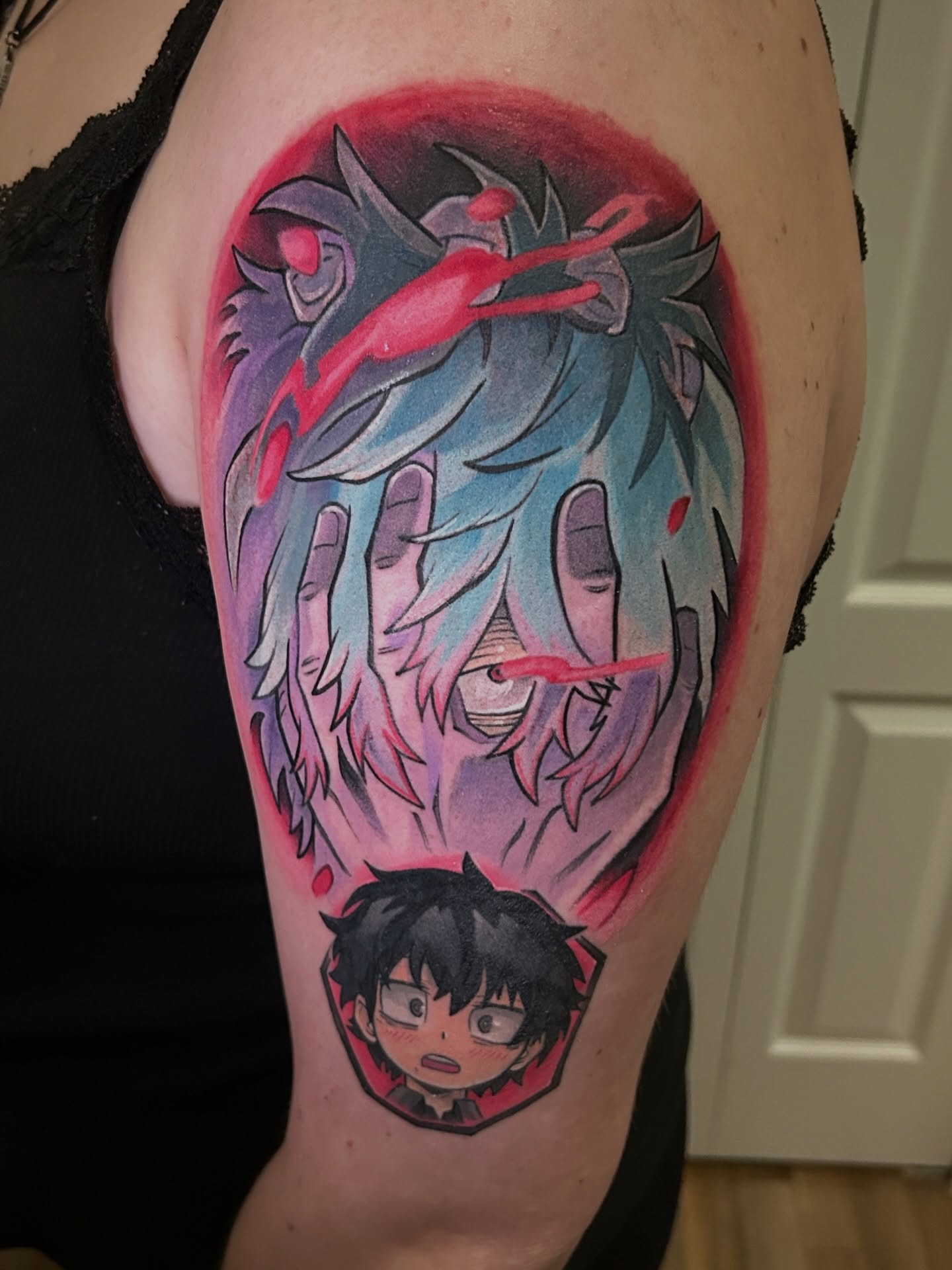 Anime character with dragon anime tattoo on the shoulder by Mando Castro