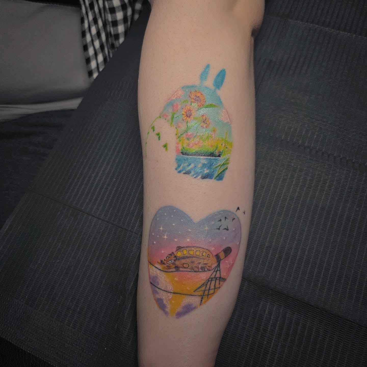 House and garden watercolor tattoo on the forearm by julian