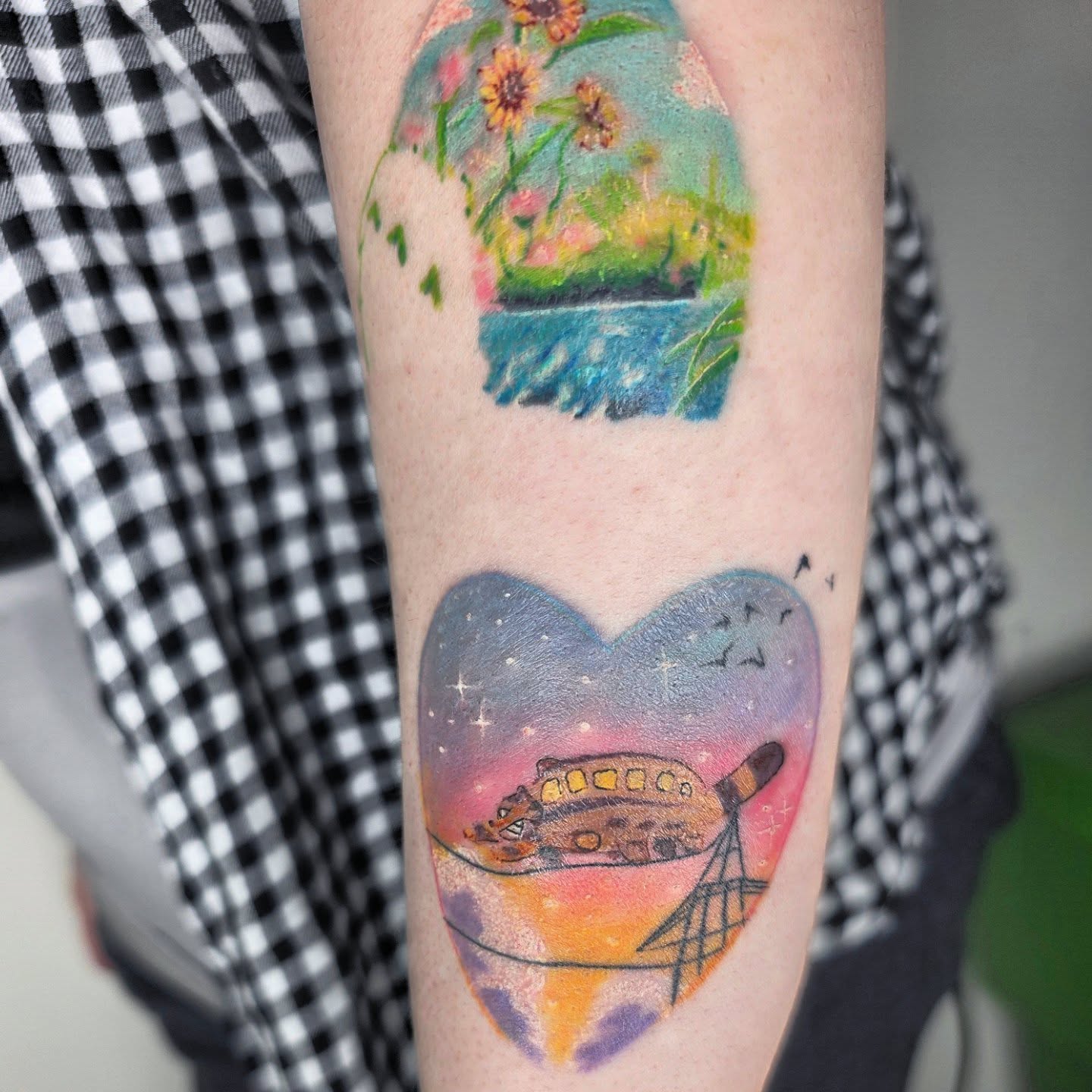 Train and heart dotwork tattoo on the forearm by julian
