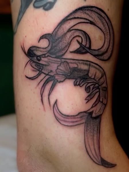 Shrimp black and grey tattoo on the forearm by Misha Dumois, Seattle, Washington