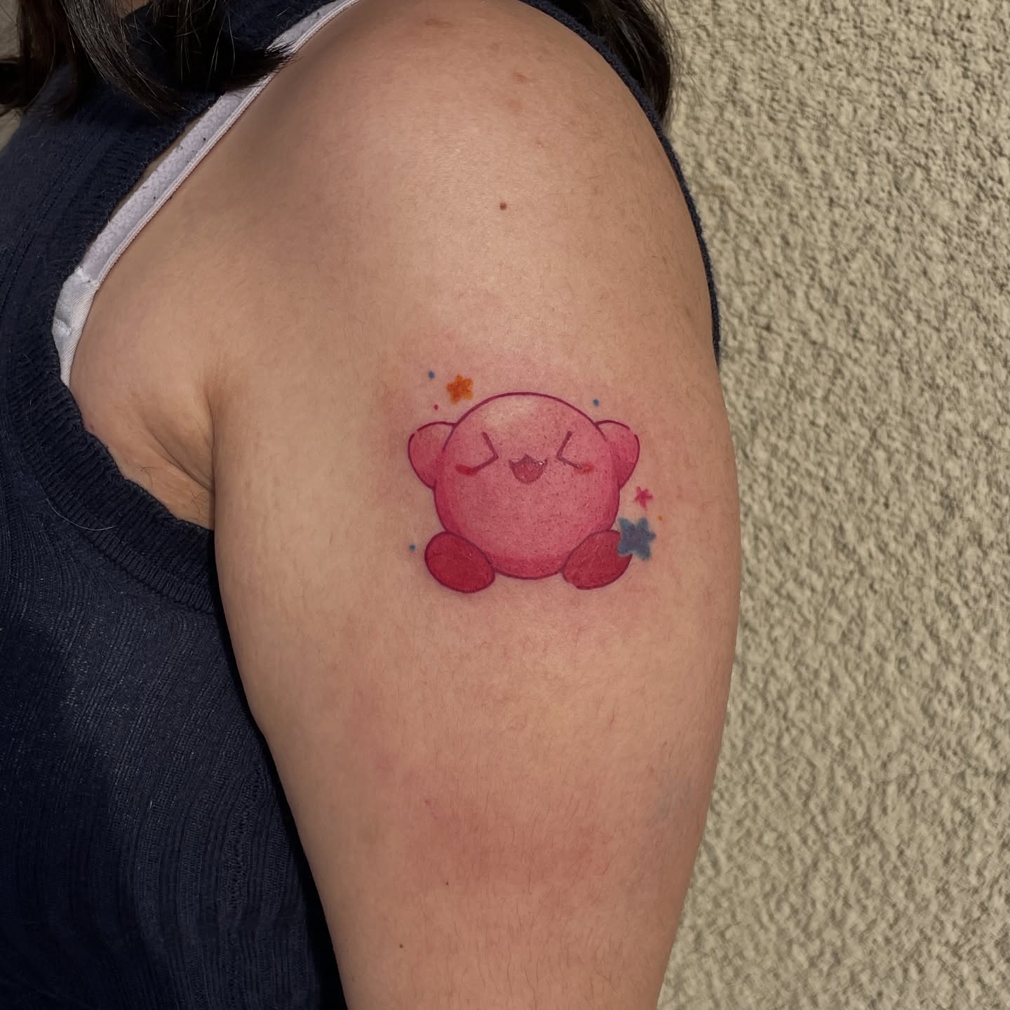 Kirby watercolor tattoo on the shoulder by Mia 	\(★ω★)