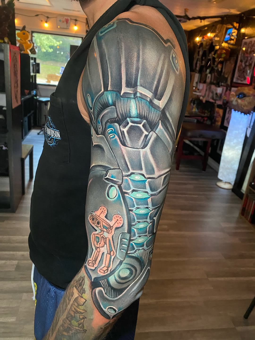 Biomechanical robot sleeve biomech tattoo on the upper arm by Tattertot