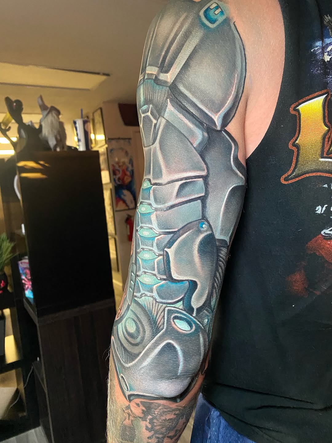 Biomechanical armor biomech tattoo on the forearm by Tattertot