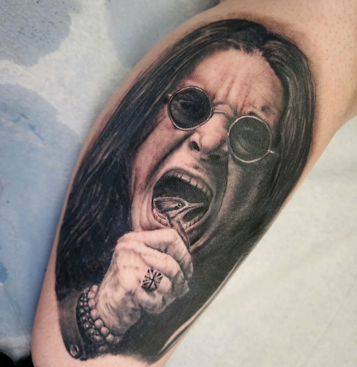 Scream realism tattoo on the forearm by Zach Mullins