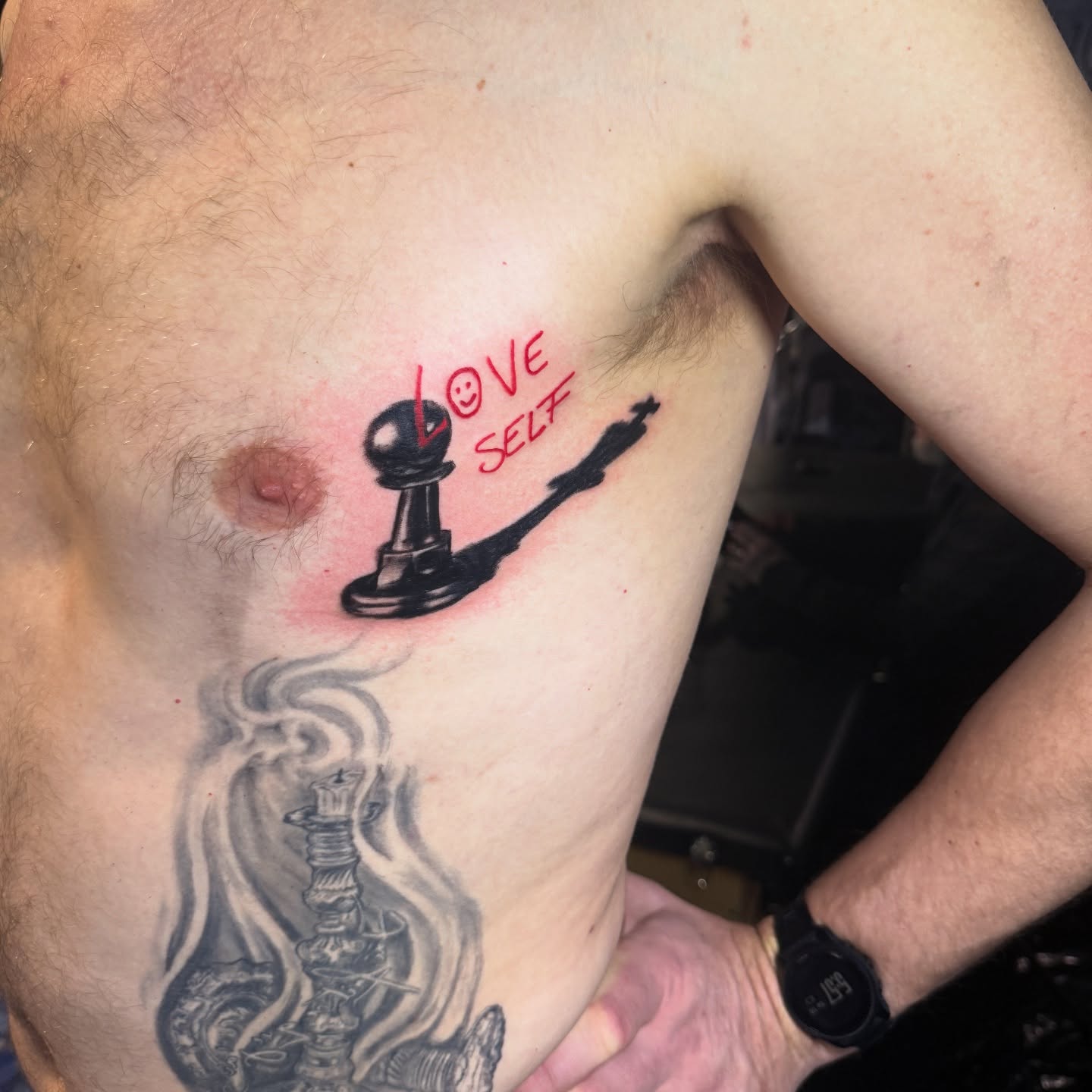 Chess pawn black and grey tattoo on the chest by Emac, Baltimore, Maryland