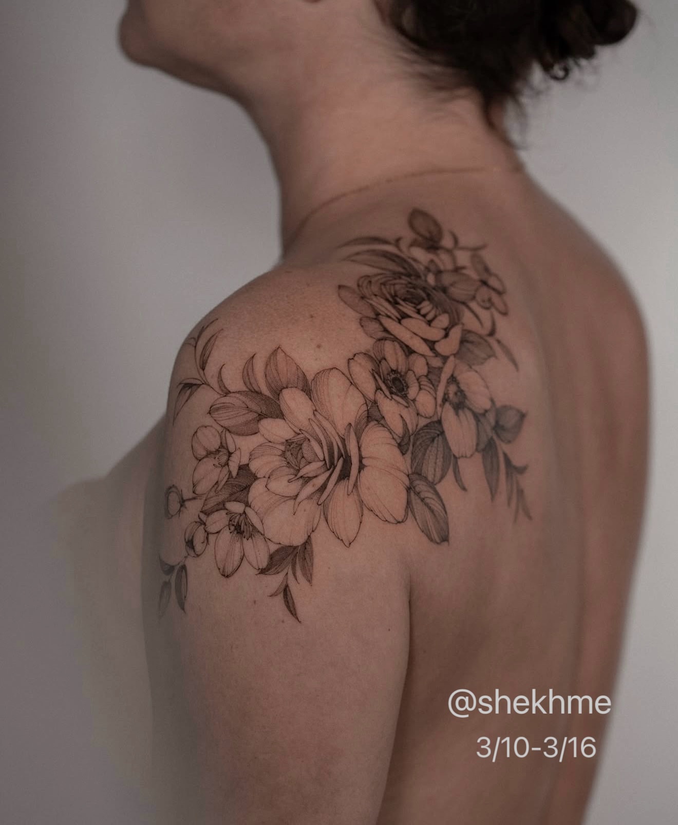 Floral bouquet black and grey tattoo on the shoulder by Mary Shekh