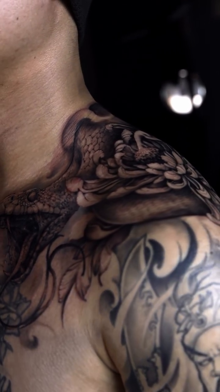 Snake and chrysanthemum realism tattoo by LaurenBeez