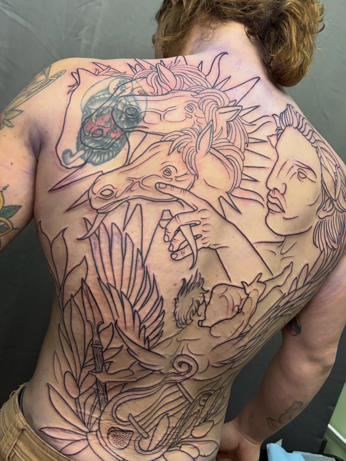 Mythical creature and woman black and grey tattoo on the back by BodyArtByAlia
