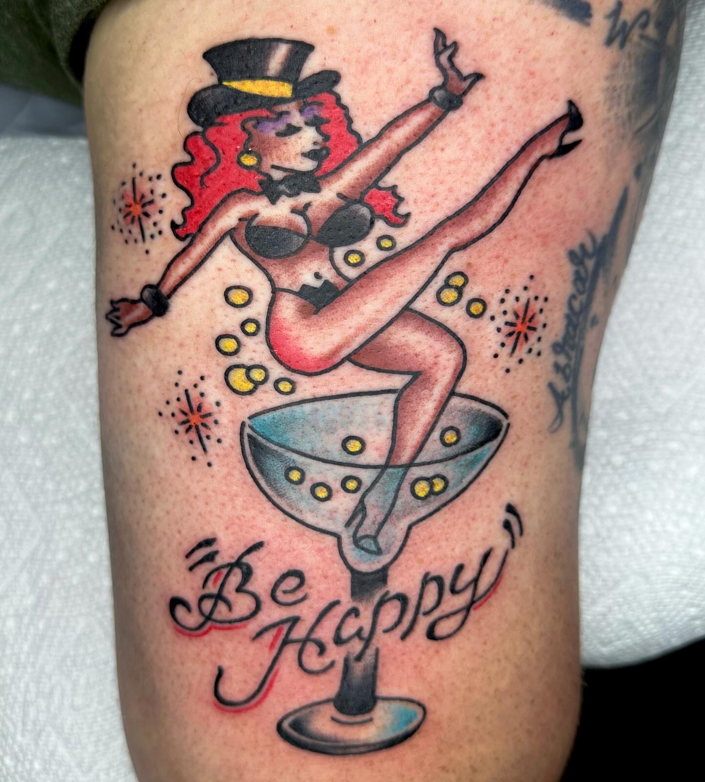 Female burlesque dancer American traditional tattoo on the thigh by David Devaney, Knoxville, Tennessee