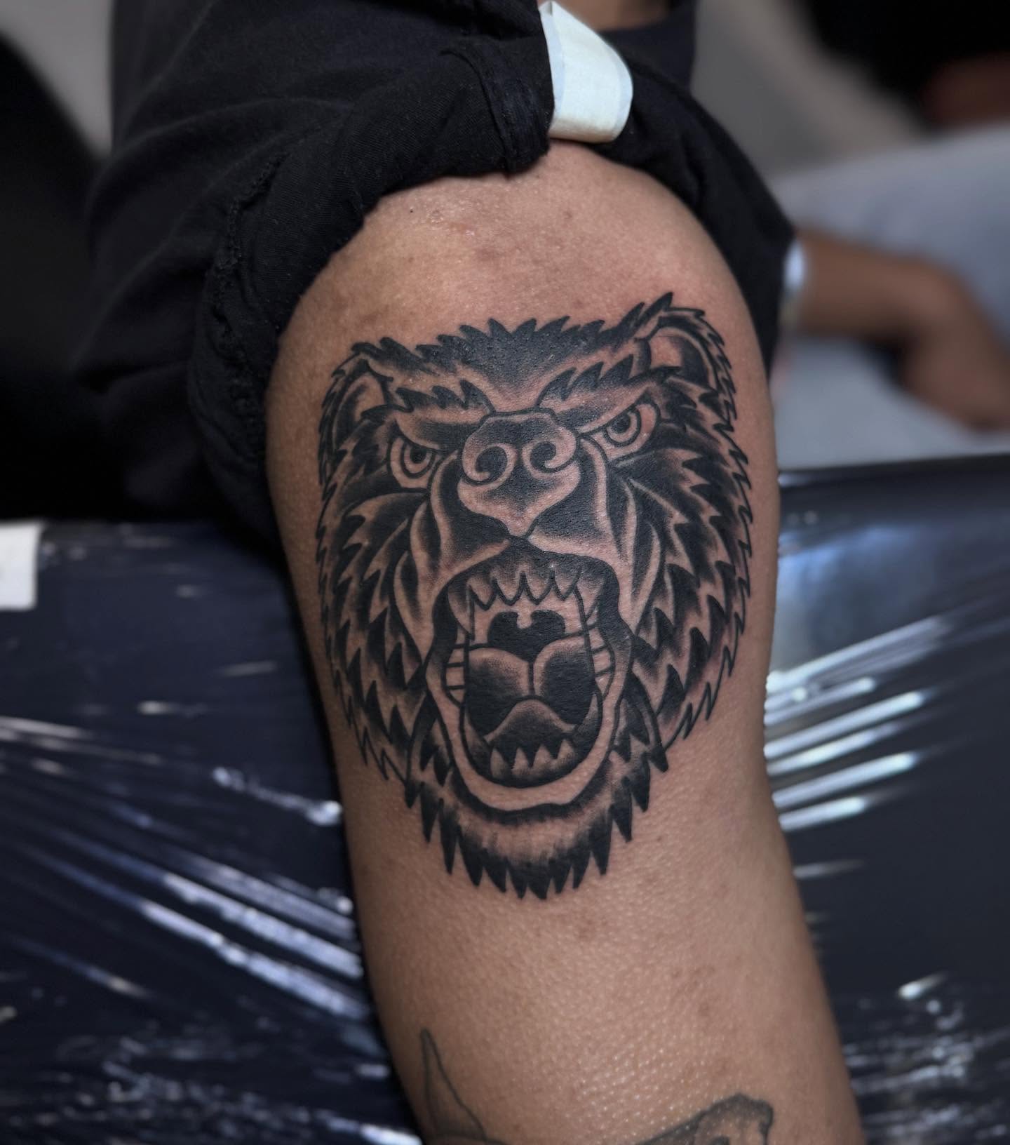 Roaring bear black and grey tattoo on the forearm by Jacob - Tattoo Artist