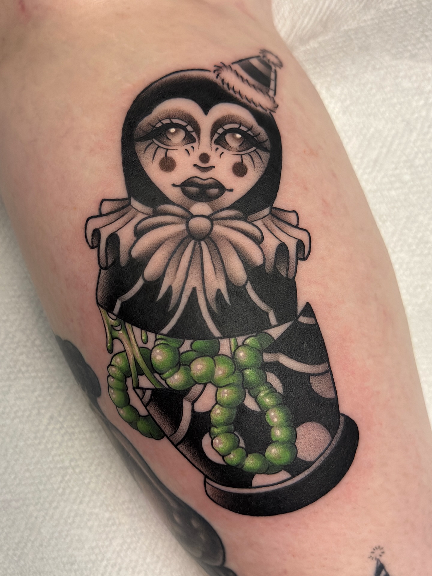 Matryoshka doll black and grey tattoo on the forearm by Amy Jean, Minneapolis, Minnesota