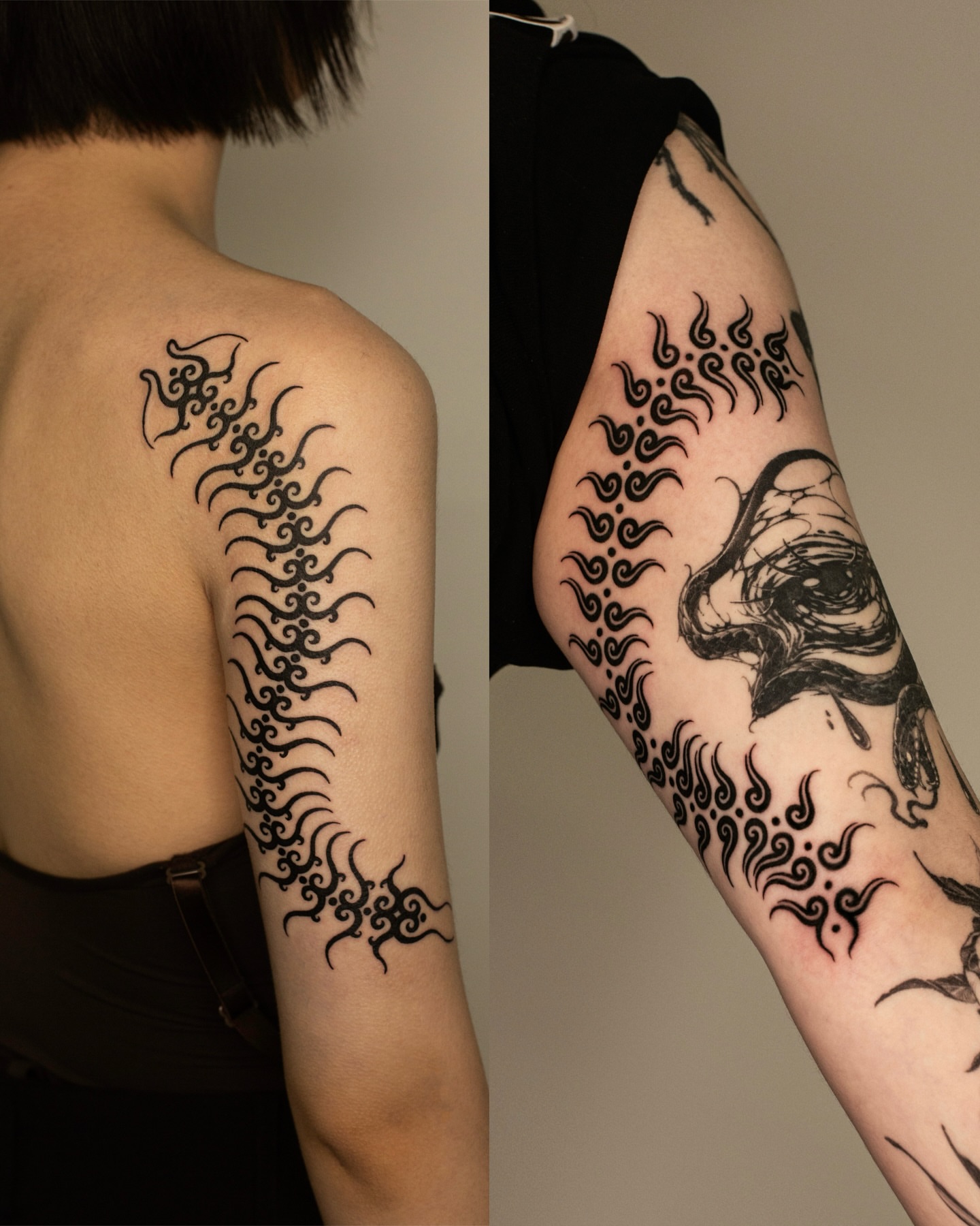 Tribal wave pattern tribal tattoo on the upper arm by Fisher Man