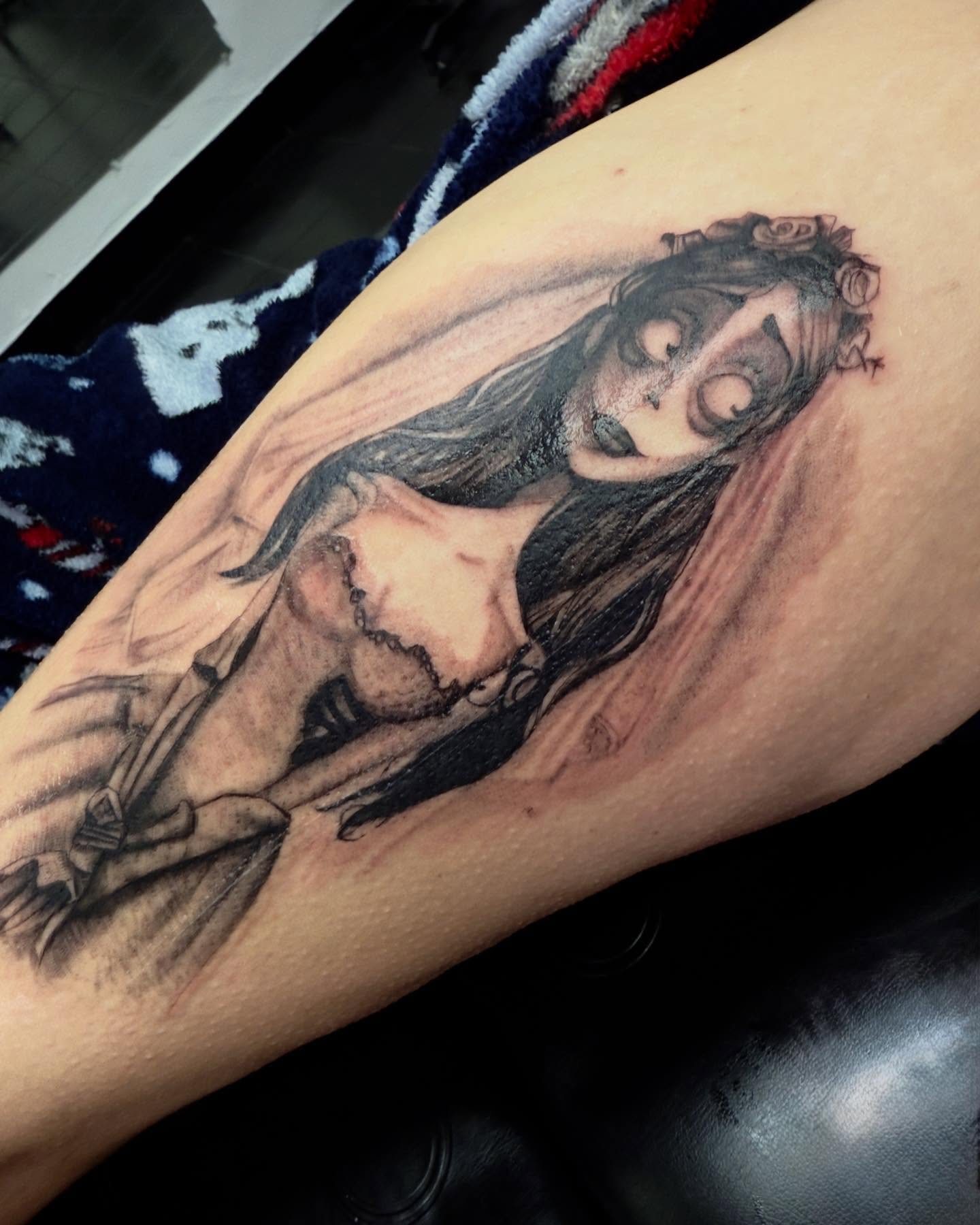 Woman with roses realism tattoo on the forearm by Rachel