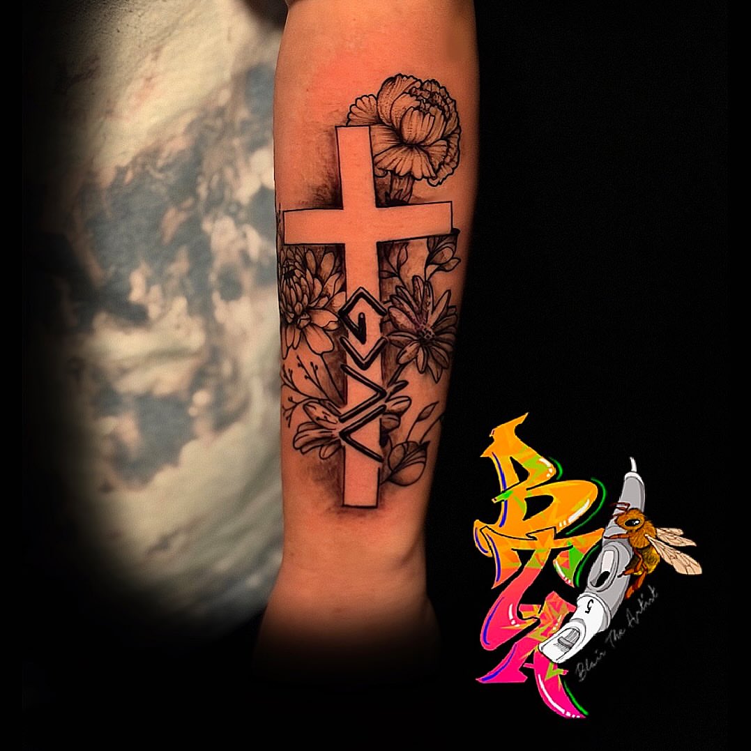 Cross with floral elements black and grey tattoo on the forearm by Blair The Artist!