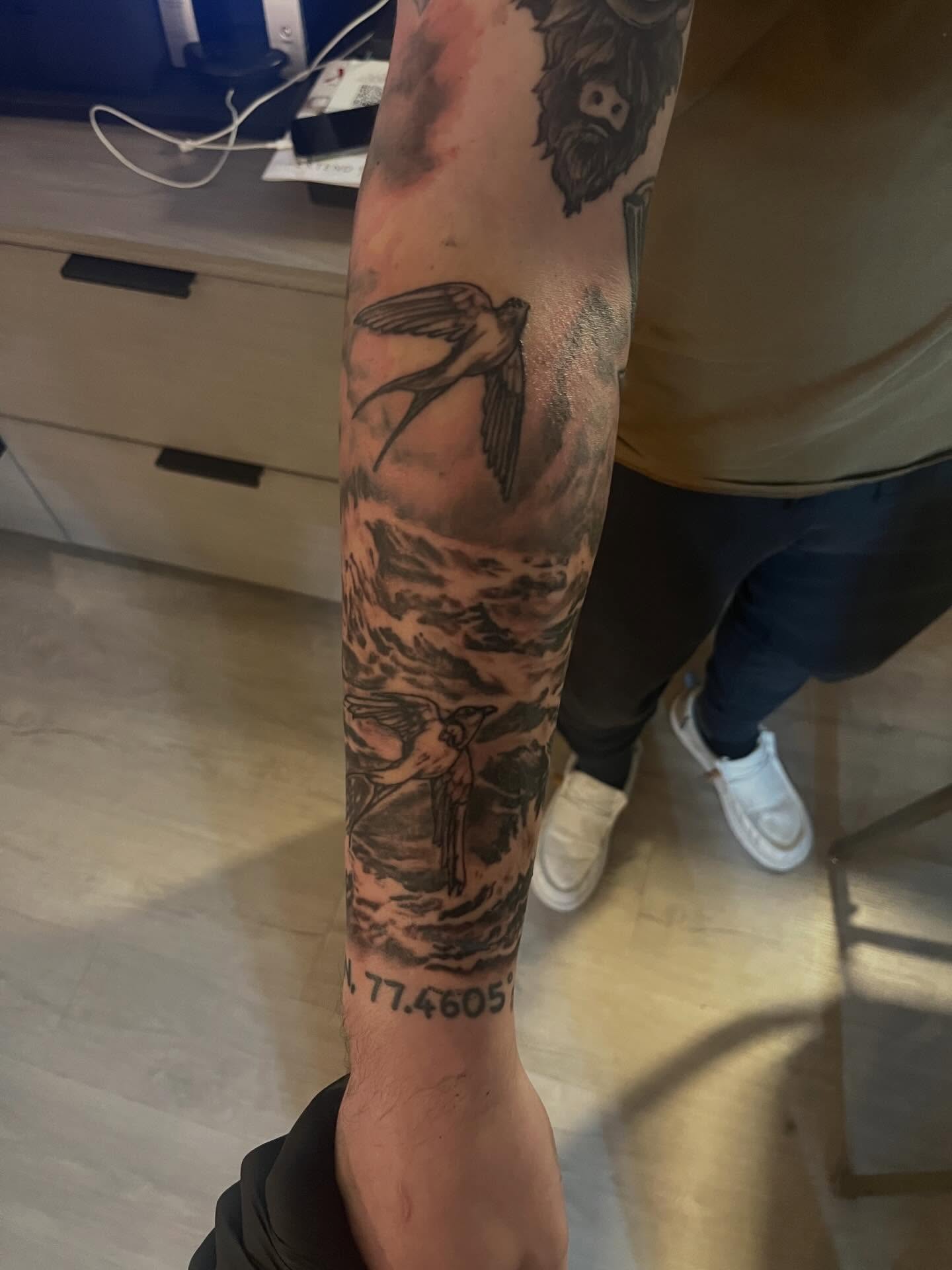 Tattoo by @moving_muralsart — black_and_grey