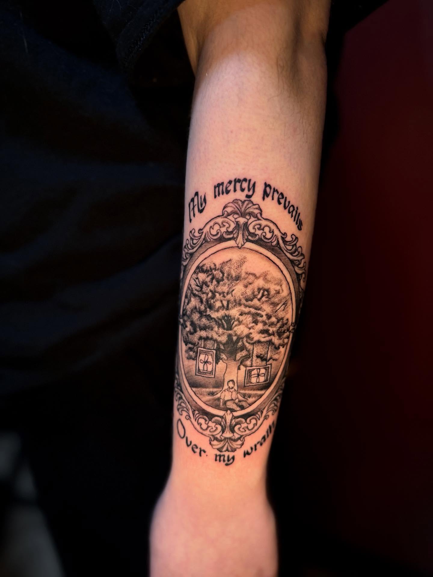 Tree and house black and grey tattoo on the forearm by Penny - Tattooer