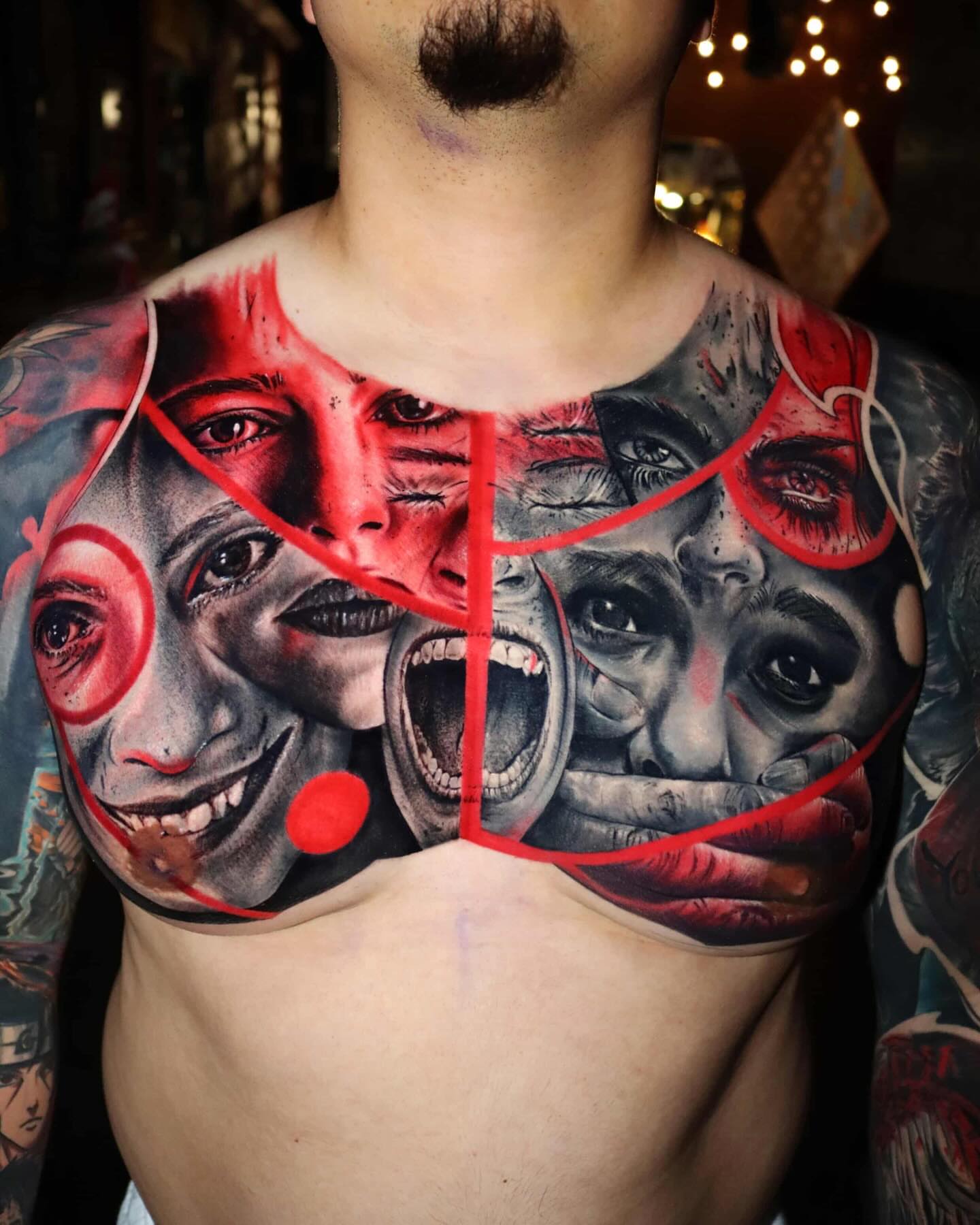 Clown faces realism tattoo on the chest by Gary Barrera