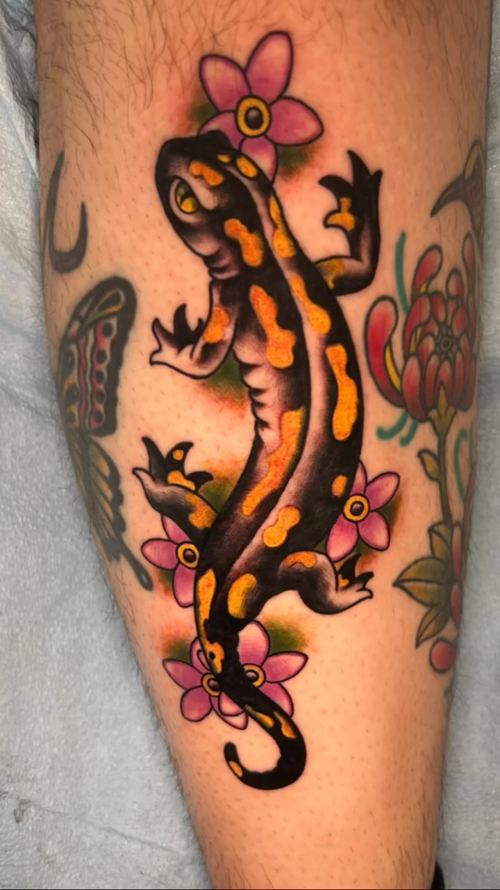 Salamander and flowers new school tattoo on the forearm by Olivia Marie