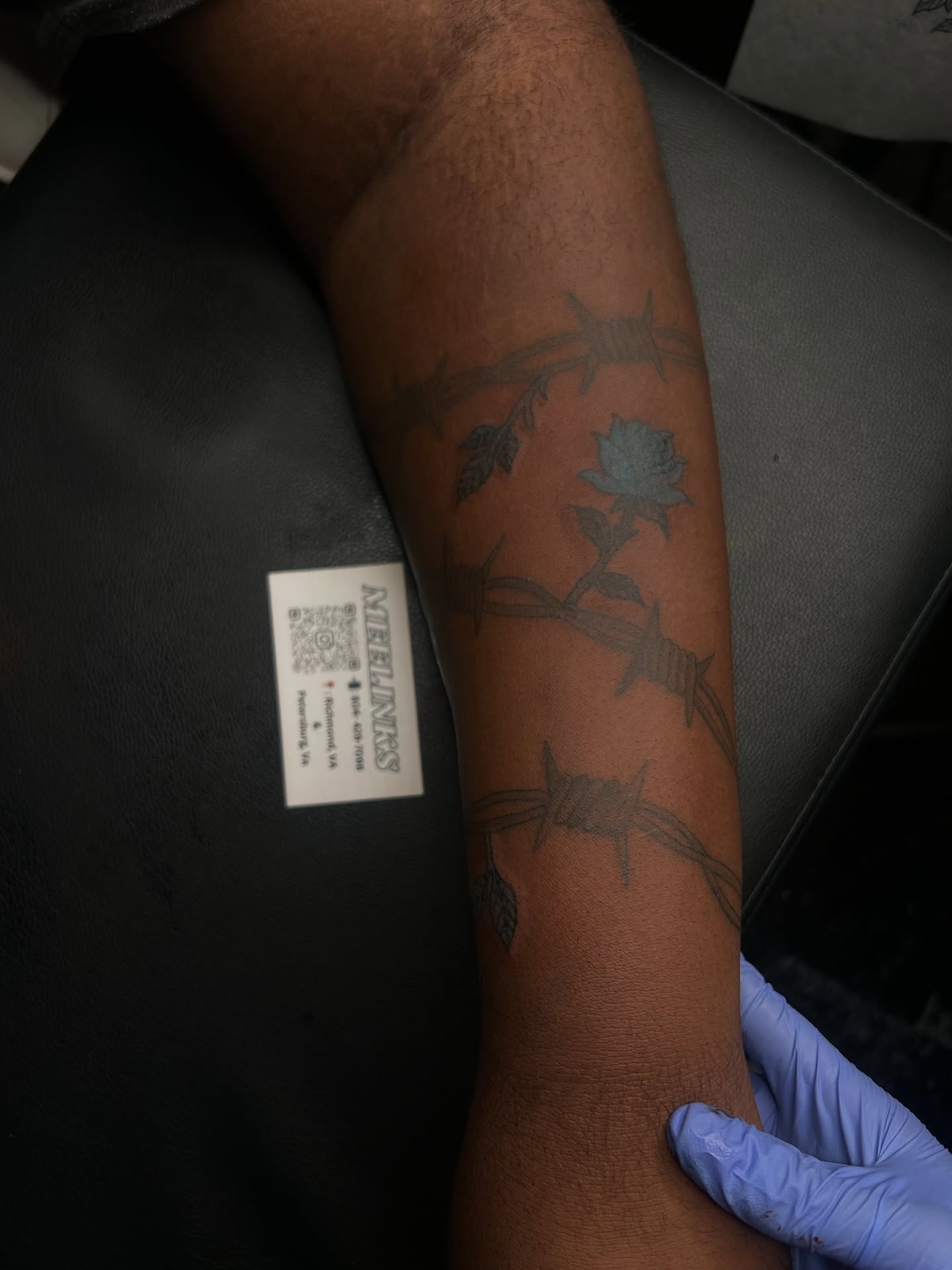 Barbed wire and rose black and grey tattoo on the forearm by Meela Inks ๐, Richmond, Virginia