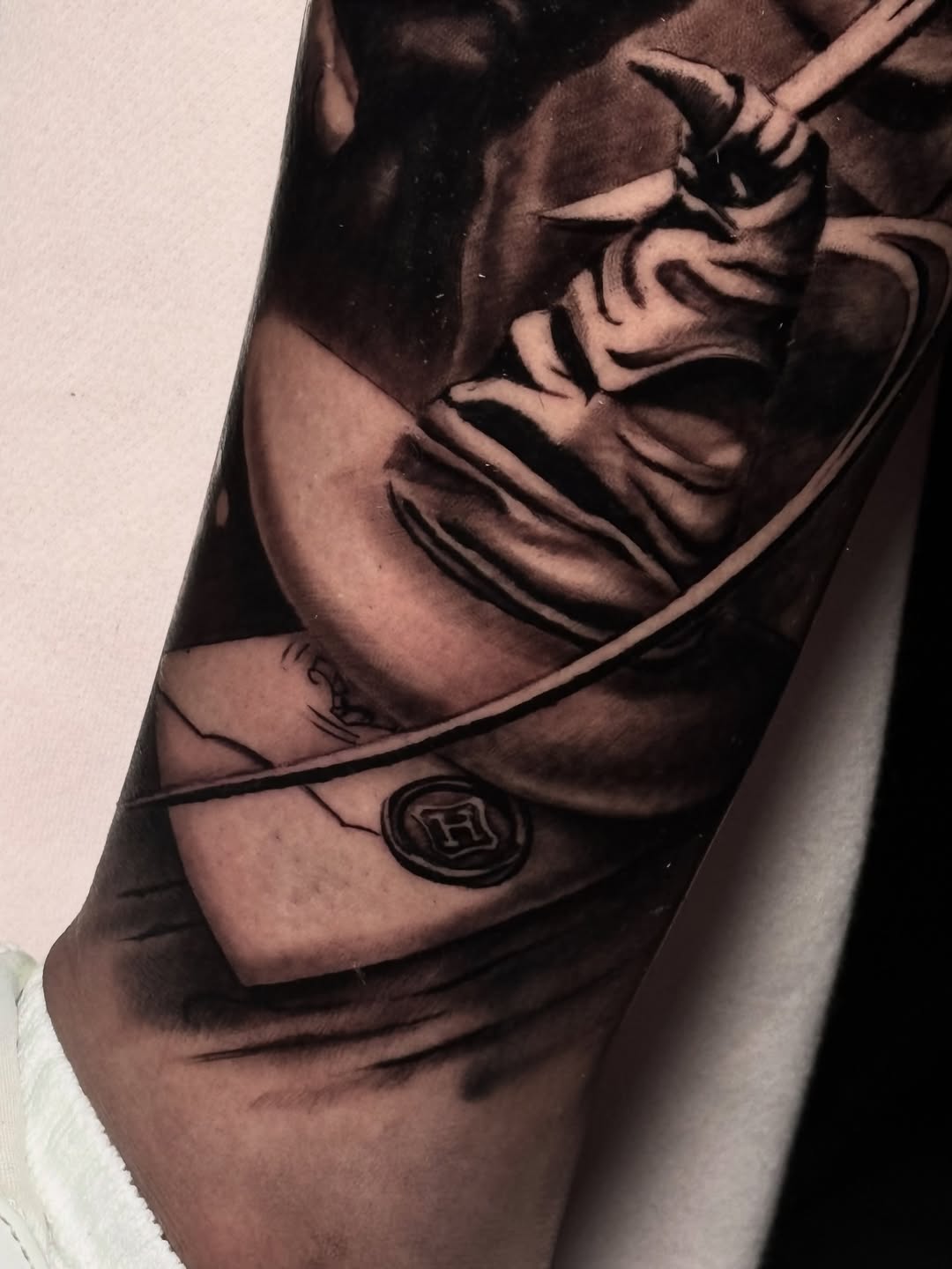 Tattoo by @doriink — realism, black_and_grey