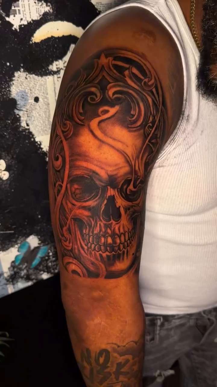 Skull with ornate frame realism tattoo by Shane Boss, Toronto, Ontario