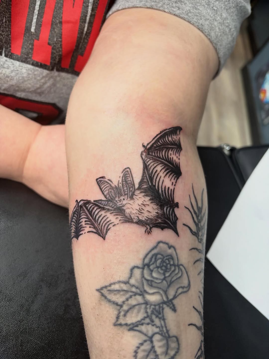 Bat fine line tattoo on the forearm by Madison