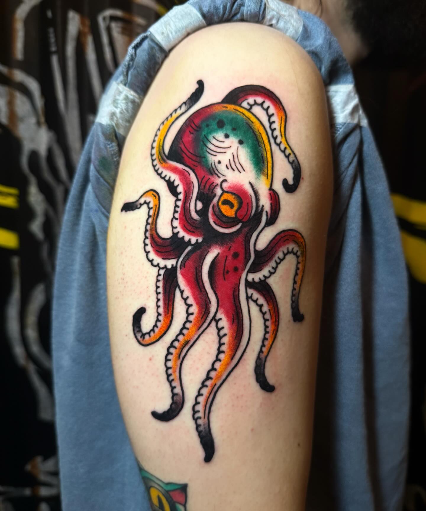 Octopus American traditional tattoo on the shoulder by Shelby