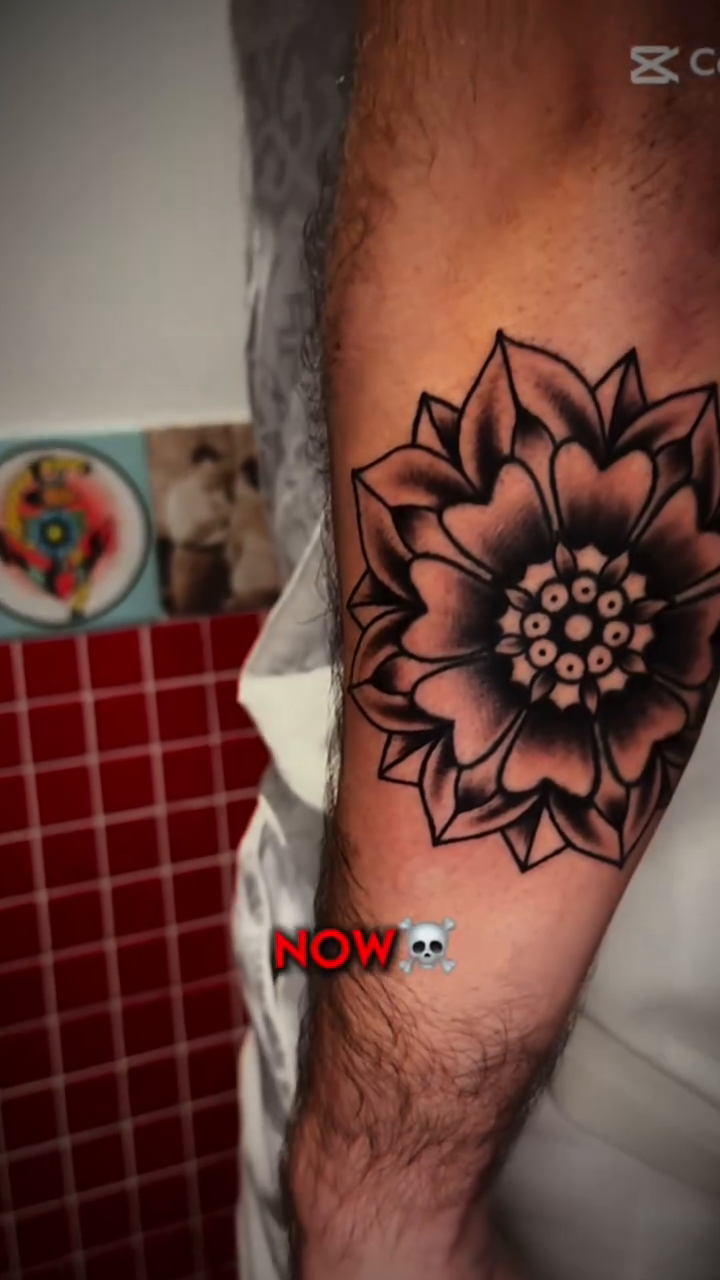 Lotus flower geometric tattoo by Tiago Britto