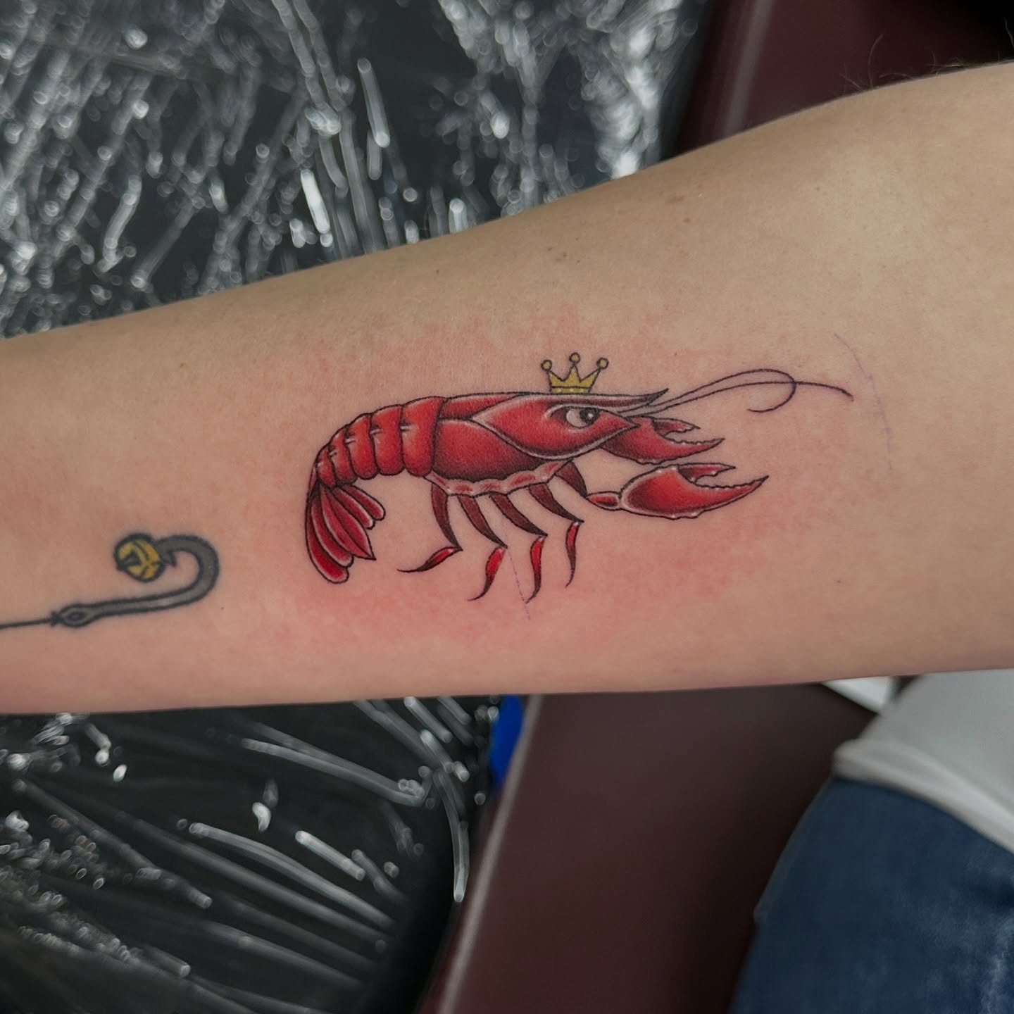 Lobster American traditional tattoo on the forearm by Tattoos by Rey G.