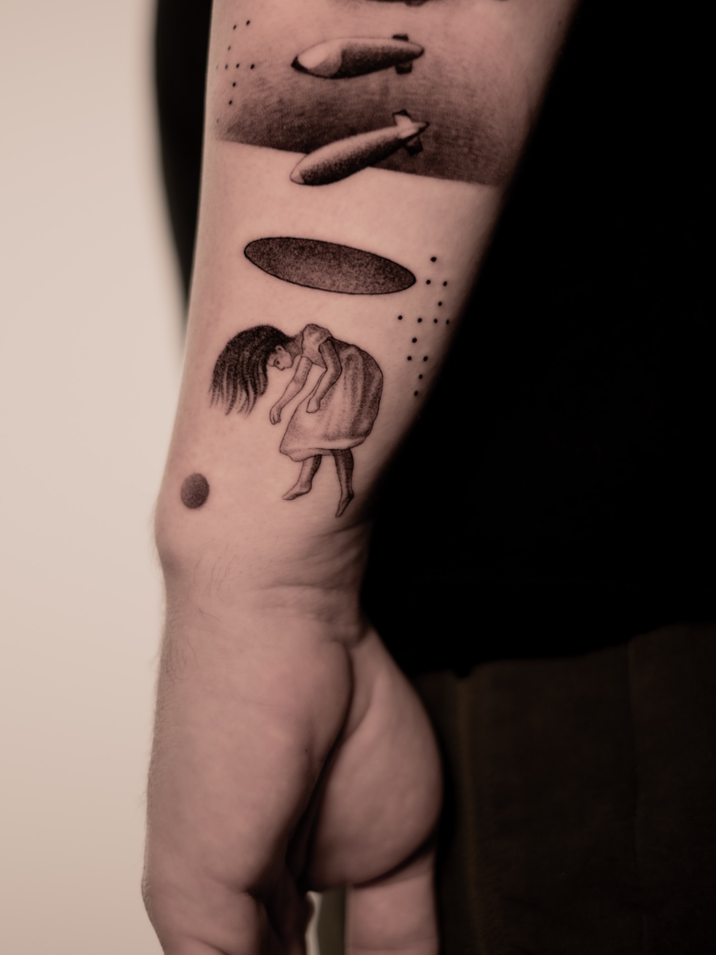 Woman with wings dotwork tattoo on the forearm by Mark D, Los Angeles, California
