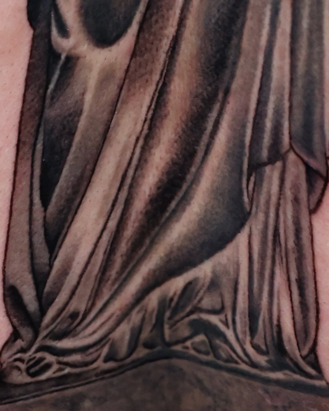 Draped fabric black and grey tattoo by Scott!!!