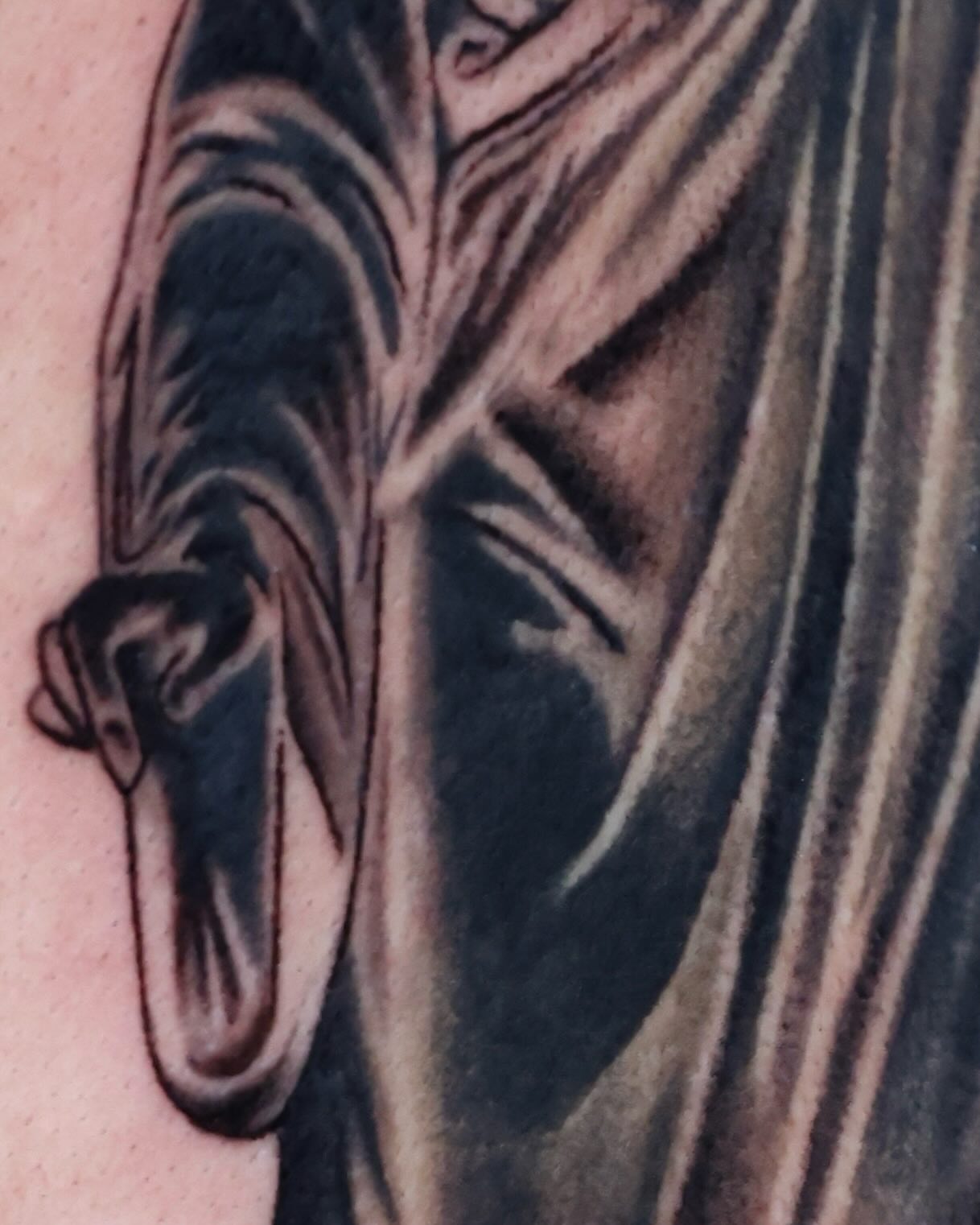 Horse black and grey tattoo on the upper arm by Scott!!!