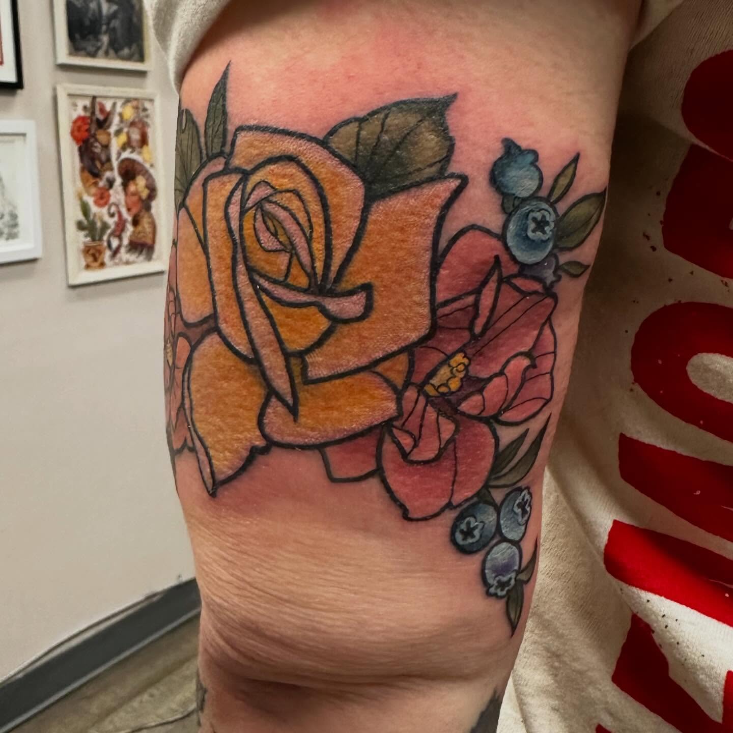 Floral arrangement American traditional tattoo on the forearm by Katie Beth