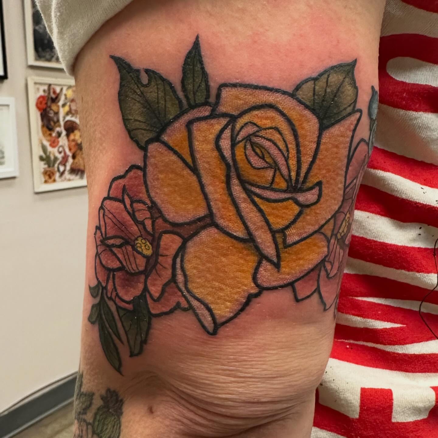 Roses American traditional tattoo on the forearm by Katie Beth