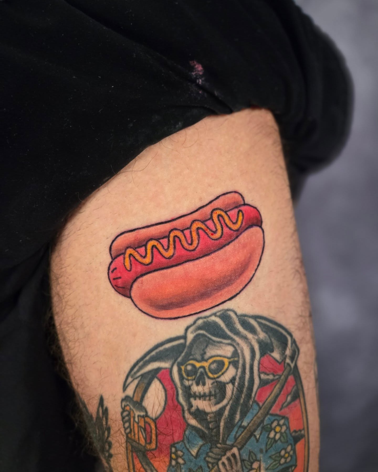 Hot dog American traditional tattoo on the thigh by Matt Page
