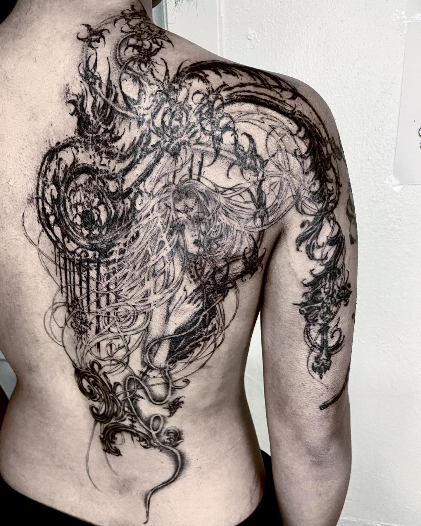 Female figure with intricate patterns ornamental tattoo on the back by ༒ ₐₙ𝓰ₑₗₐ  ༒
