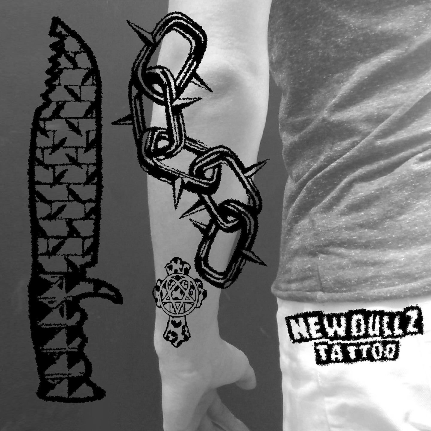Chains and cross black and grey tattoo on the forearm by 𝔠𝔲𝔯𝔱𝔦𝔰 ~ tattoo artist