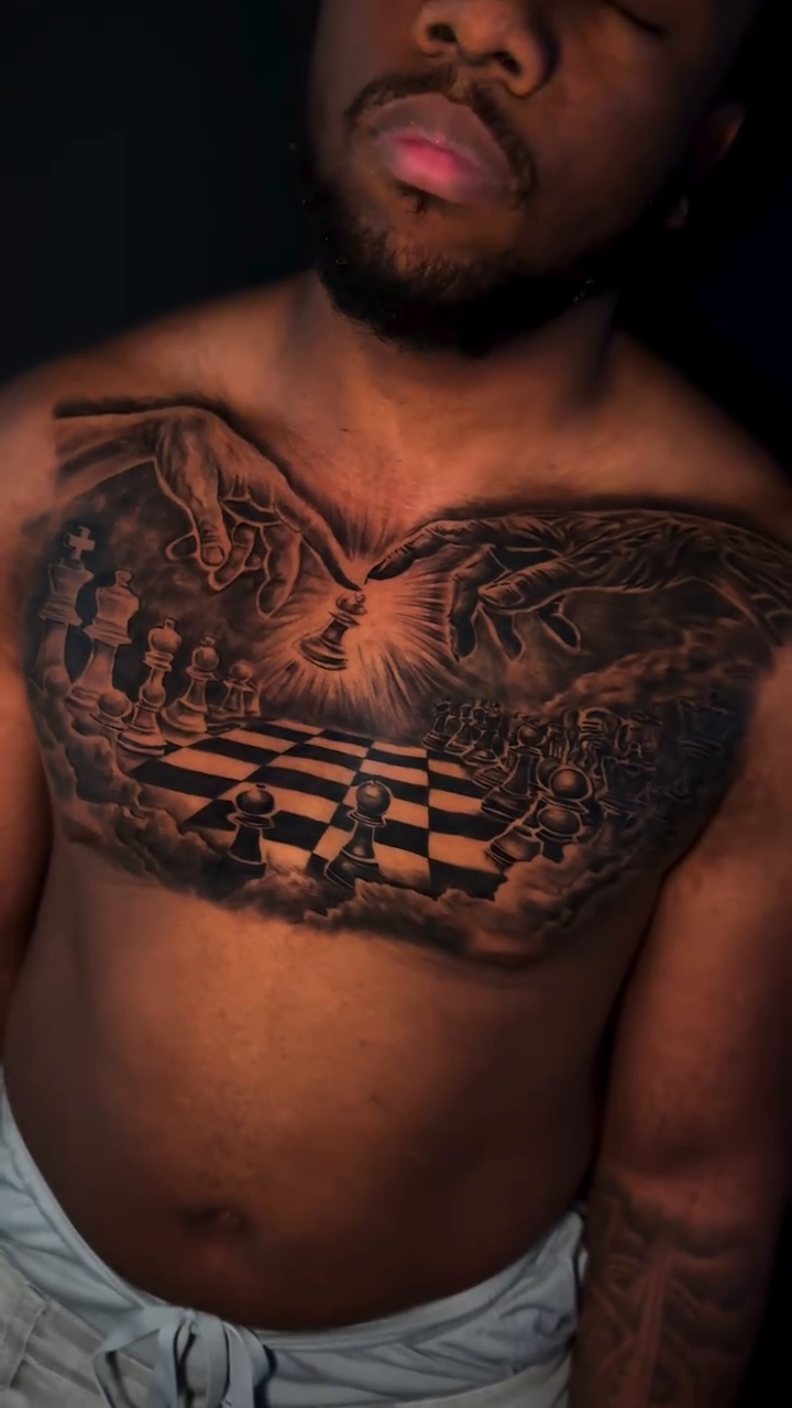 Chess game with angelic figures realism tattoo by Tattoo Artist